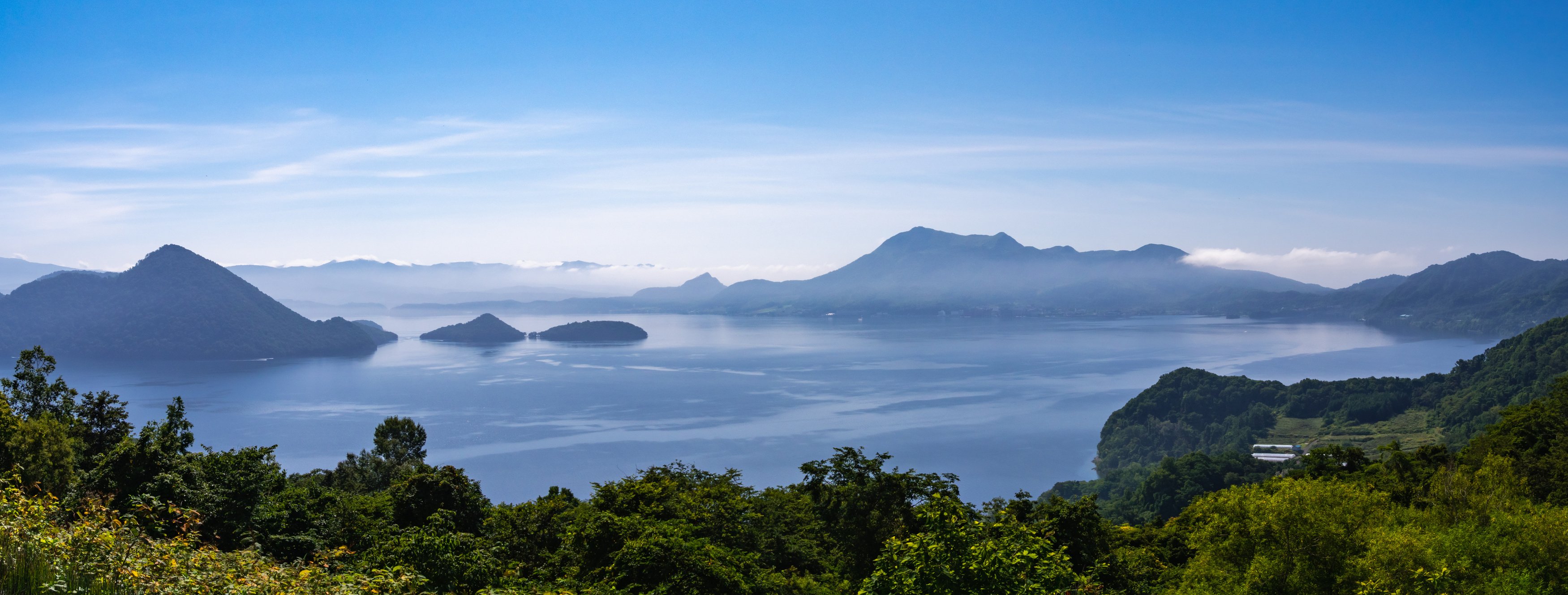 Lake Toya (Toyako) is part of the Shikotsu-Toya National Park. Lake Toya is one of Hokkaido's foremost tourist destinations. Lake Toya is a caldera lake formed from volcanic activity.